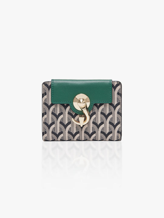Green wallet with geometric pattern on a white background