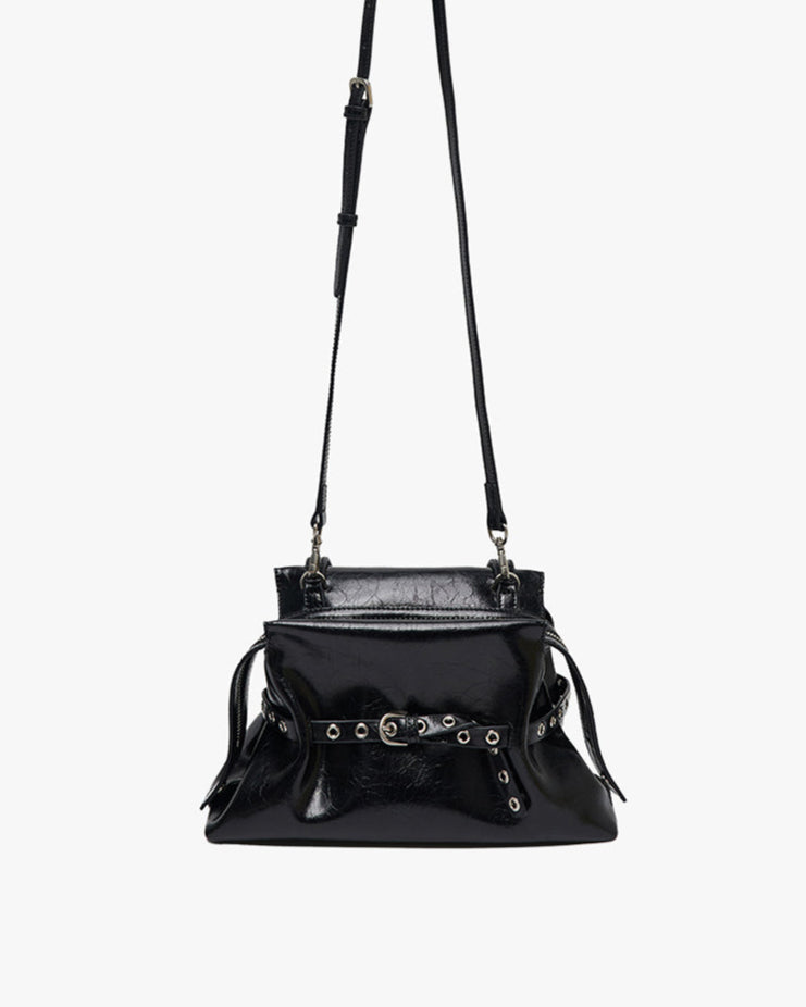 Black handbag with a strap on a white background