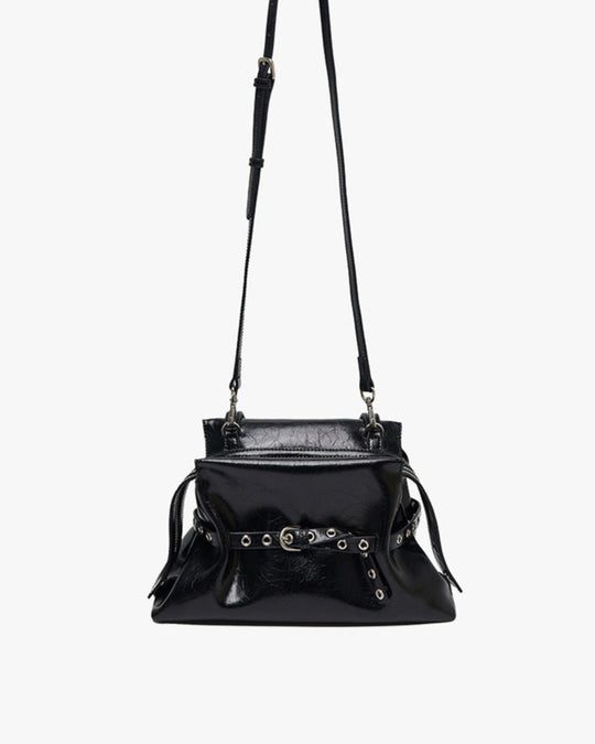Black handbag with a strap on a white background